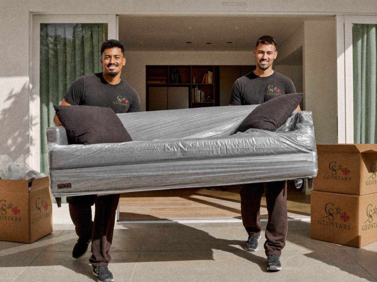 Movers carrying a sofa out of a home